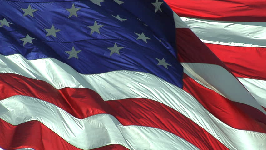 HD clip of the American flag wavering close up. 