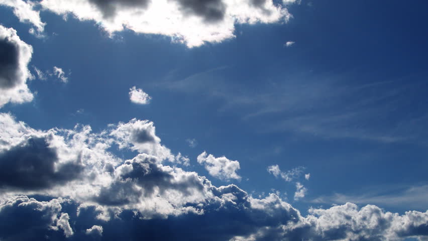 A beautiful time lapse of clouds against a very blue sky. 