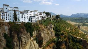 4k Ronda, Spain. Panoramic view of the old city of Ronda, the famous white village. The New Bridge. Province of Malaga, Andalusia, Spain