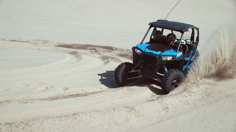Super slow motion shot of ATV driving on sand dunes, Oregon, shot with Phantom Flex 4K