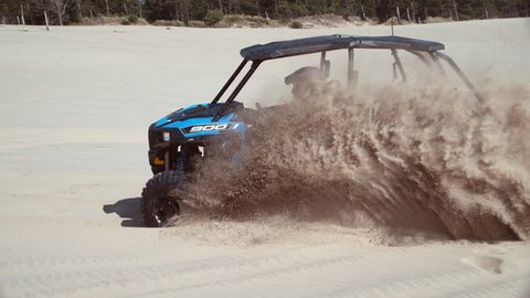 Super slow motion shot of ATV driving on sand dunes, Oregon, shot with Phantom Flex 4K