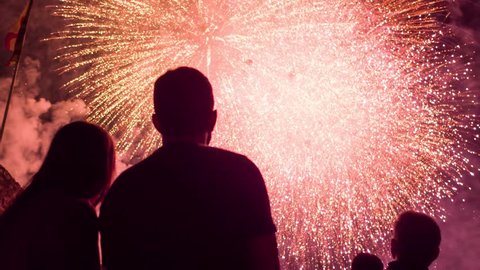 Man And Woman Silhouettes Enjoying Beautiful Fireworks Show New Years Eve Fourth Of July Romantic Date Anniversary Concept