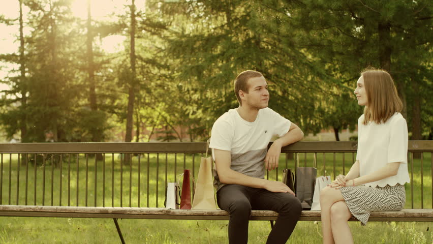 man and woman in the park