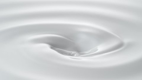 Milk droplets falling into swirl of milky liquid. Shot with high speed camera, phantom flex 4K. Slow Motion. Unedited version is included at the end of clip.