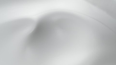 Splashes and swirl in milky liquid surface. Slow Motion. Shot with high speed camera, phantom flex 4K. Slow Motion.