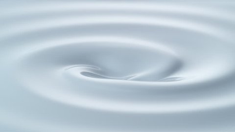 Swirl in milky liquid surface. Shot with high speed camera, phantom flex 4K. Slow Motion.