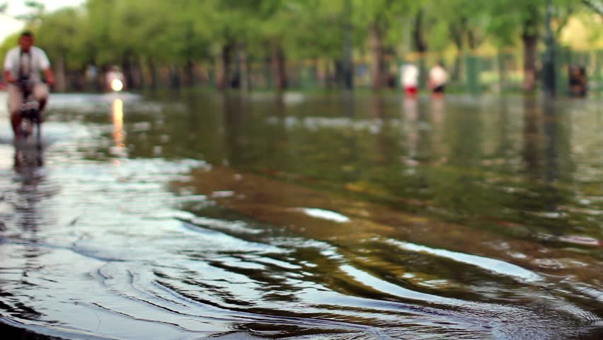 Street under flood in Bangkok Thailand.
Life continues