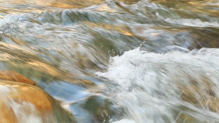 water flowing down the river, camera lock down