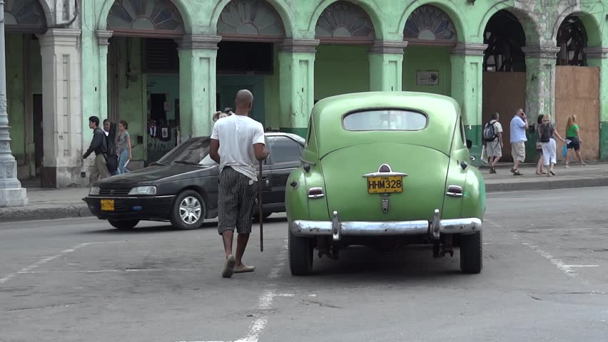 HAVANA, CUBA - DECEMBER 2011 - Old cars (pre 1960 american) in front of the
