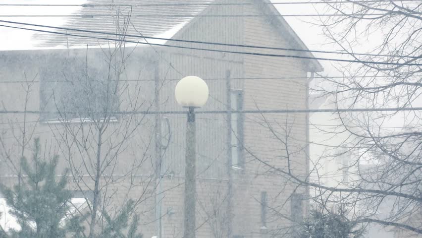House during snowstorm.
