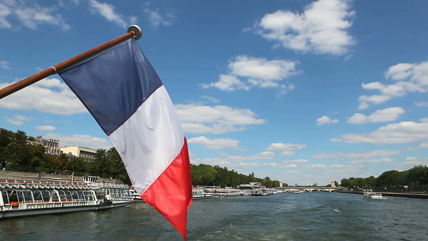 floating down the river on moving boat with french flag 1080x1920 HD video