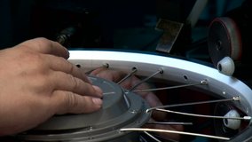 bicycle spokes assembly at bike factory for e bike wheel - Powered by Shutterstock - Get 15% off with code: PIKWIZARD15