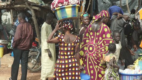 Sept 2015 OuÃ©lessÃ©bougou, Mali, 
Rallenty. a market in Mali.
Video shots from a car to a market in Mali during the epidemic period of ebola. 