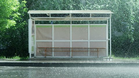 Empty bus stop during the heavy rain. Shot on RED EPIC Cinema Camera in slow motion.