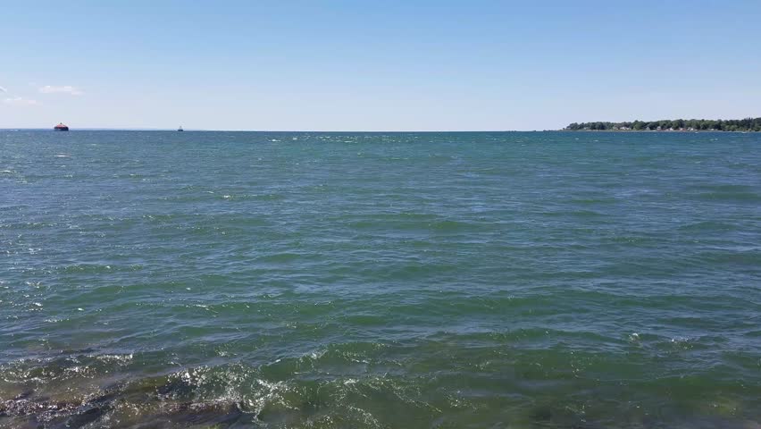BUFFALO, NEW YORK, USA  August 23, 2016: View of the source of the Niagara River and Lake Erie. Fort Erie, Ontario, Canada visible in the distance.

