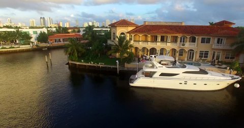 Aerial shot of the yacht near luxury villa, Miami Beach, Atlantic Ocean