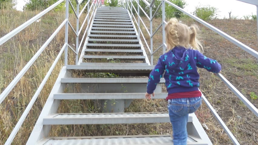 kid climbing stairs