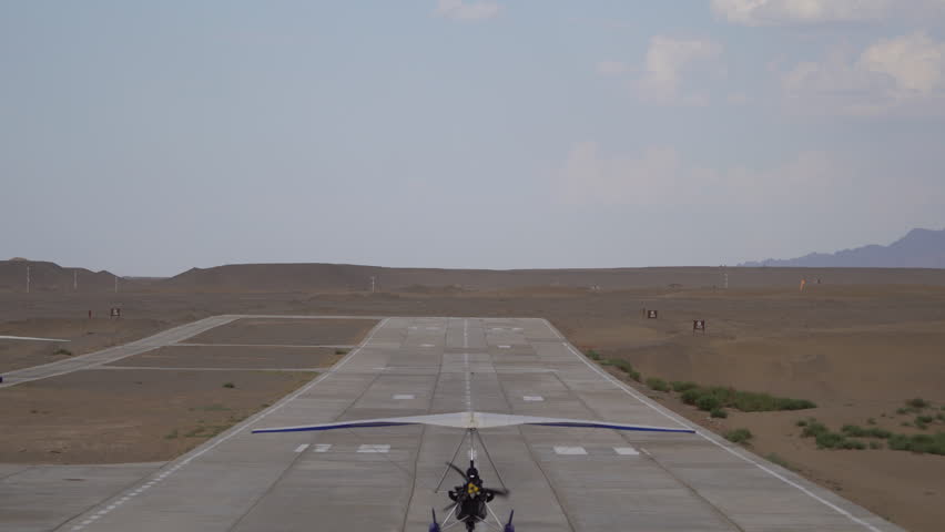 Glider taking off from gobi desert,Dunhuang,China