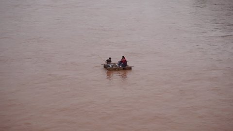 June,8,2016-Lanzhou,China: people sailing sheepskin raft on Yellow river