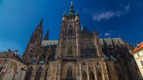 St. Vitus Cathedral timelapse hyperlapse in Prague surrounded by tourists. Located within Prague Castle and containing the tombs of many Bohemian kings and Holy Roman Emperors.
