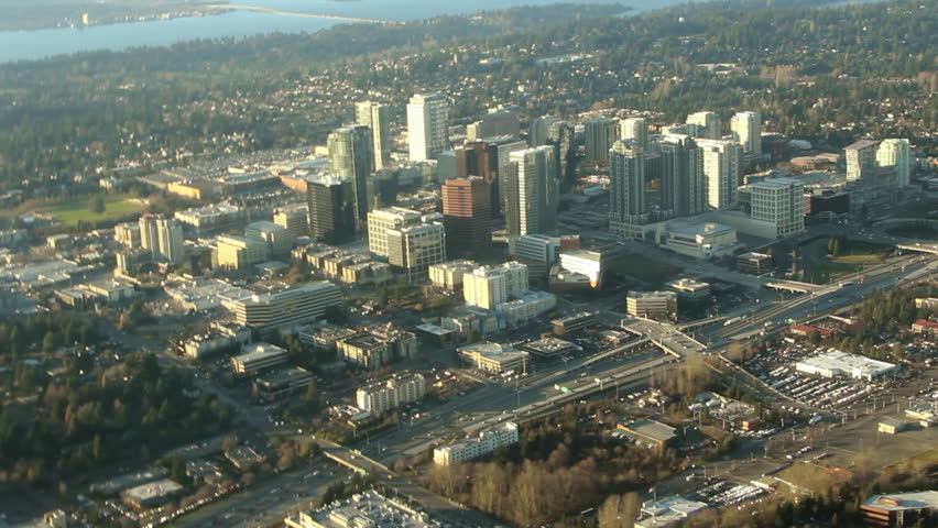 Aerial view flying over Bellevue, WA near sunset