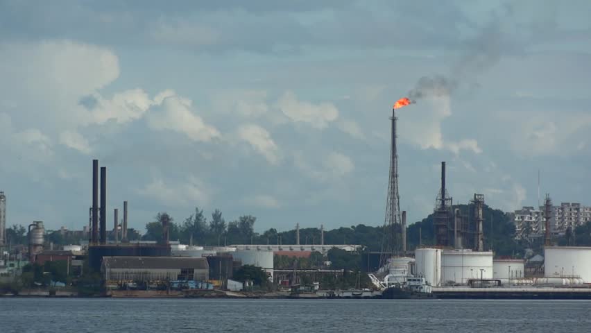 Oil refinery burning gas flame.