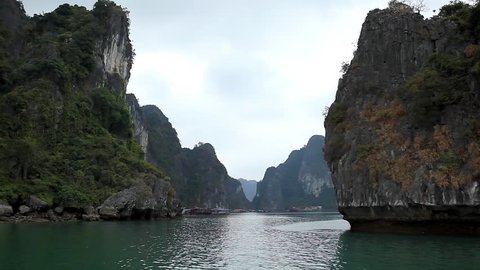 POV Ha Long Bay (Descending Dragon Bay), Vietnam, UNESCO World Heritage Site, Tour Boats (point of view) Spectacular Vietnamese Islands, Trip Dhow Ship, Beautiful Landscape Marine, Water Scene Stock Video
