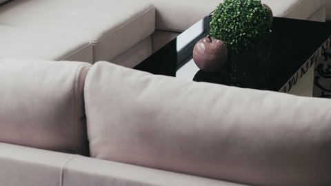 White sofa in the style of high-tech in-store.Shot in Ultra Hd