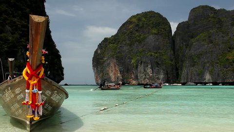 MAYA BAY, THAILAND - CIRCA 2011:  Tropical Paradise, Long Tail Boats Trip in Maya Bay, Phi Phi Islands, Thailand. 