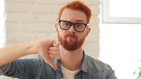 Reaction of Loss,Thumbs Down, Unsatisfied Man with Beard and Red Hairs, Portrait