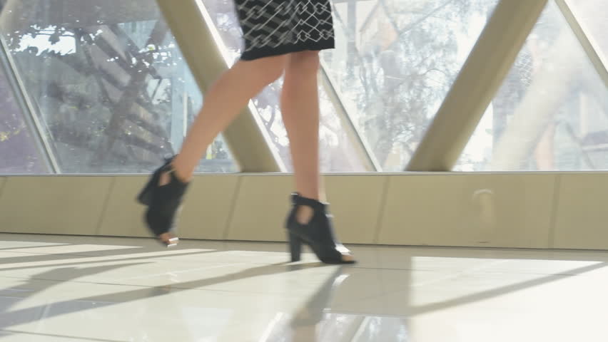 Young womans legs in business outfit walking down corridor | Shutterstock HD Video #19157611
