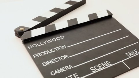 clapper for cinema with inscriptions hollywood, production, director, camera, date, scene, take