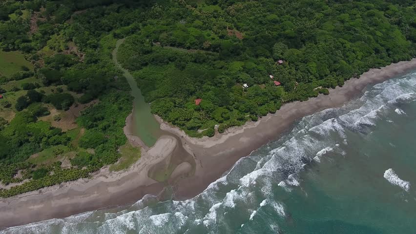 River mouth at the ocean seen from above Aerial