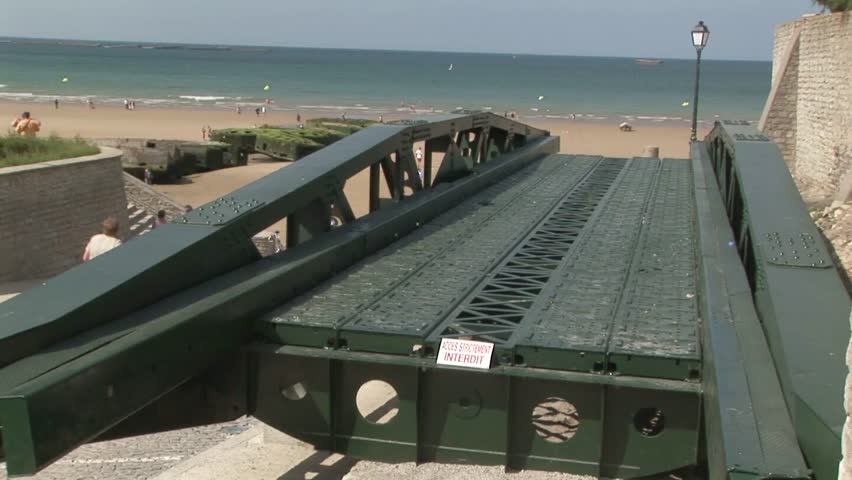 Section of a WWII Mulberry Whale Roadway part of the Mulberry Harbour on Gold Beach Beach Arromanches-les-Bains where the Normandy landings took place on D-Day June 6th 1944 in Normandy, France