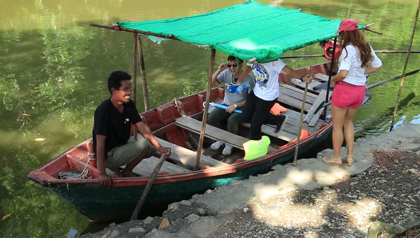 Rayong -Tung Prong Thong Thailand  ,  August 21 - 2016 : Small boat and passenger for travel around Tung Prong Thong Thailand  