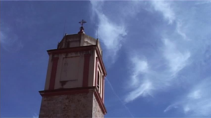 church tower with clouds