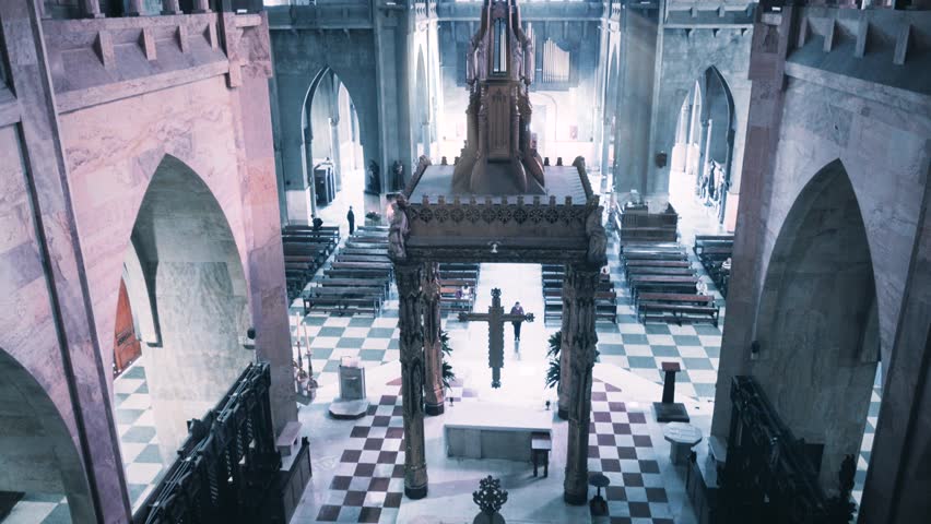 Nave of the cathedral of Manizales from the balcony when the light enters from the stained glass. 4k	