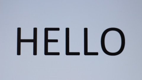 Somebody prints "Hello" on a computer
