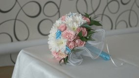 bridal bouquet of white roses and blue colors in the lace video