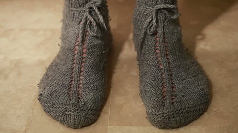 Man legs in grey socks
