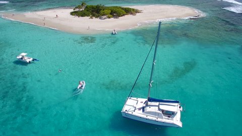 Aerial view of a luxury Catamaran at Sandy Spit, BVI