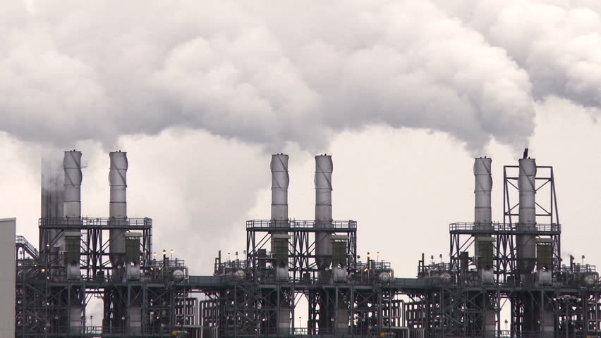 Smoke stacks of petroleum and petro chemical industry refineries