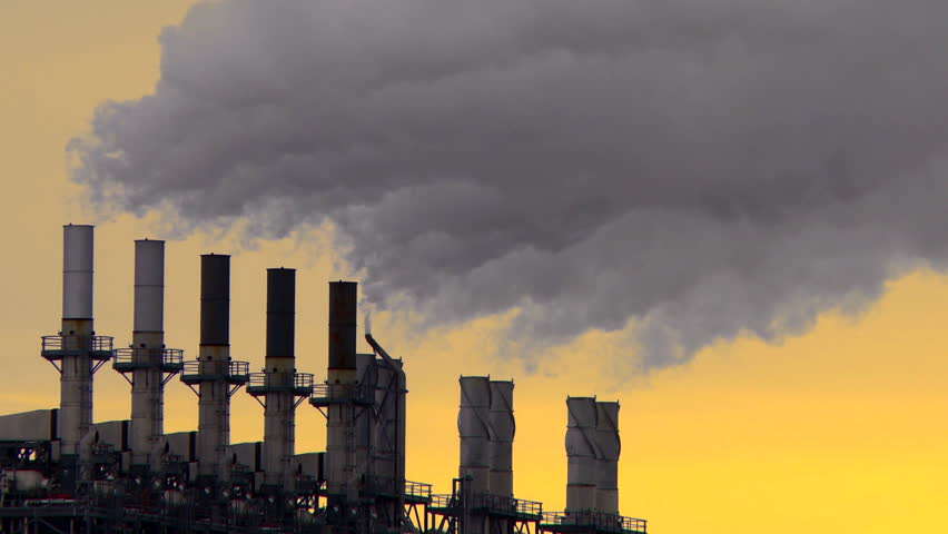 Smoke stacks of petroleum and petro chemical industry refineries