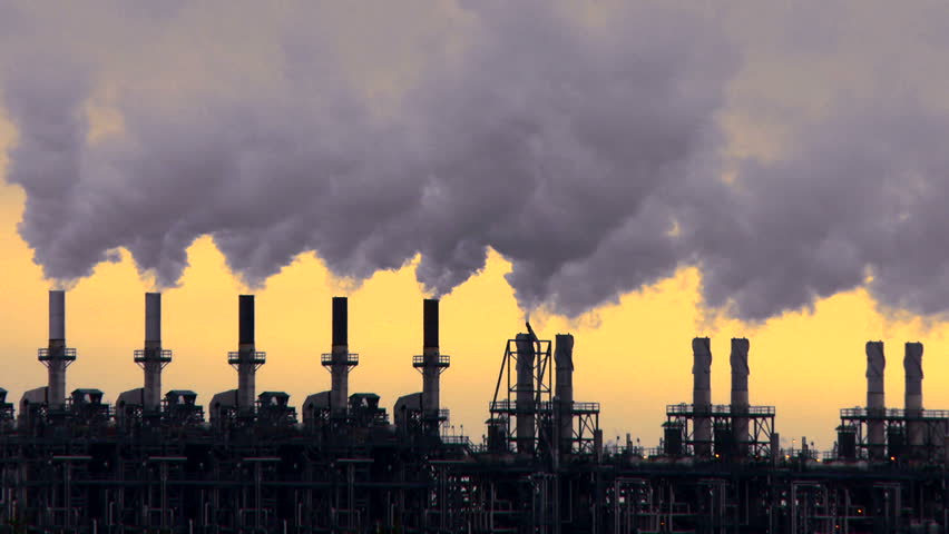 Smoke stacks of petroleum and petro chemical industry refineries