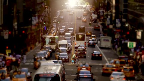 rush hour traffic commuting through new york city. busy urban street. cars transportation background.   Video Stok