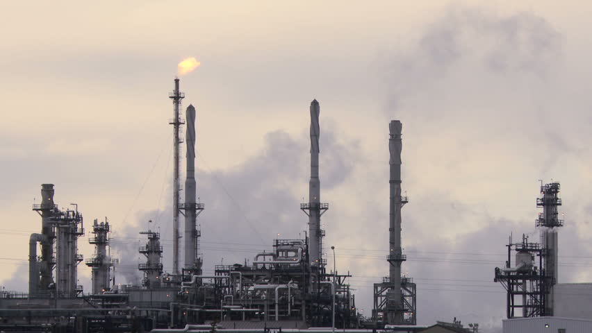 Oil refinery with smoke stack flare