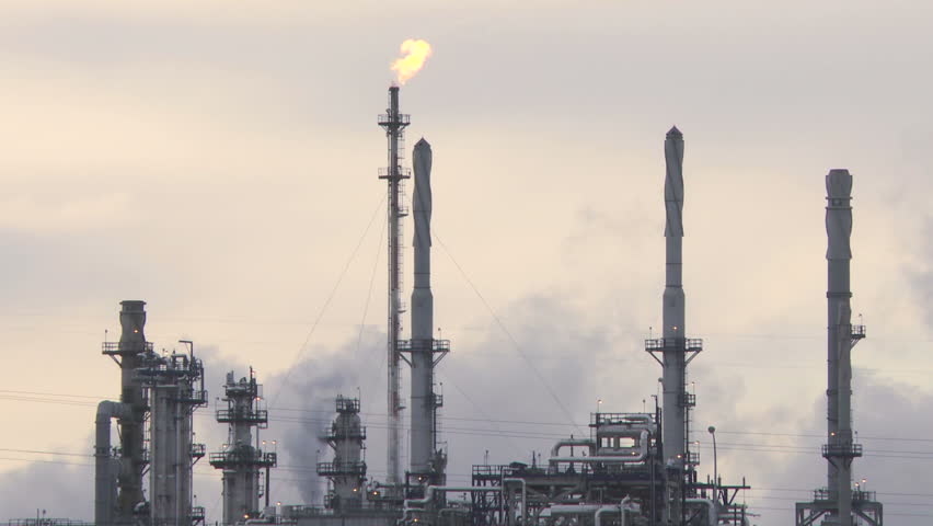 Oil refinery with smoke stack flare