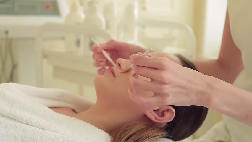 Beautiful woman with a beautician on the procedures | Shutterstock HD Video #19225102