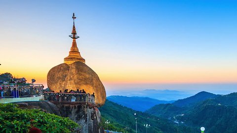 MYANMAR-DECEMBER 05: Time Lapse people area Golden rock (Kyaikhtiyo or Kyaiktiyo pagoda) Landmark of Myanmar on December 5,2015 in Myanmar 