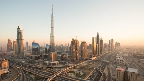 Dubai city with flow of traffic during a beautiful sunset.